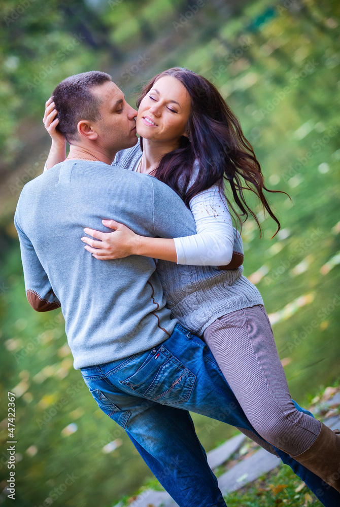 Portrait of couple enjoying golden autumn fall season Portrait of couple enjoying golden autumn fall season