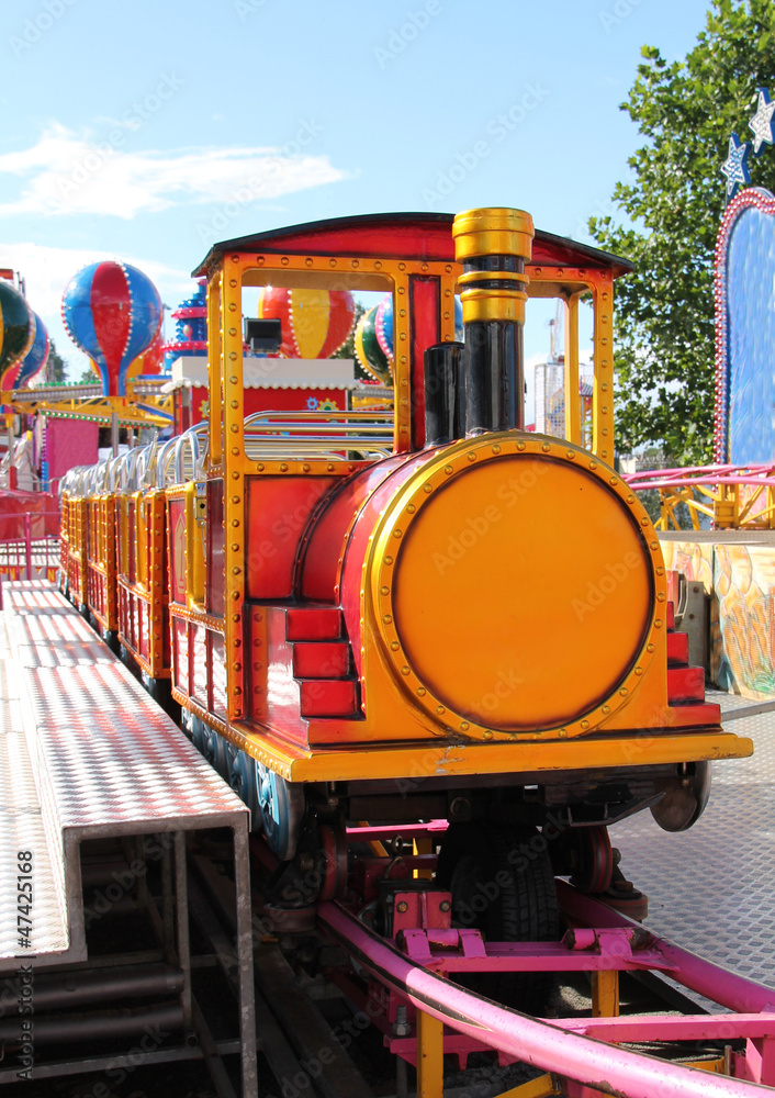 A Childrens Train Ride at a Fun Fair.