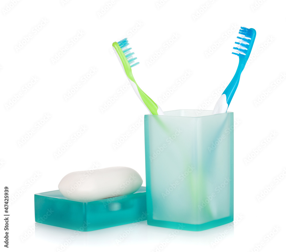 Two toothbrushes and soap Two toothbrushes and soap