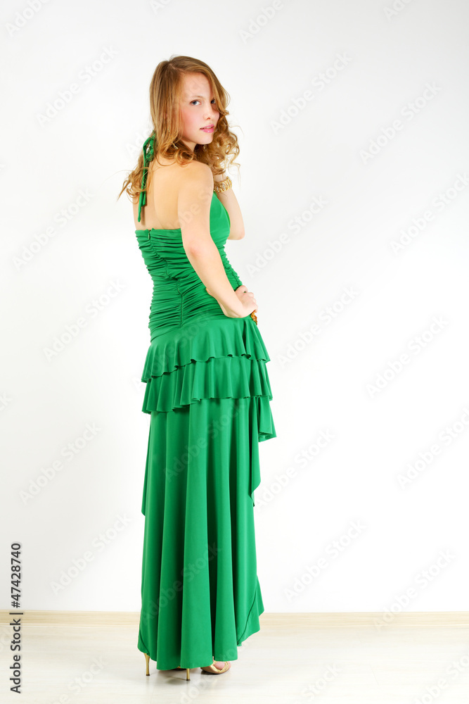 Elegant girl in green dress