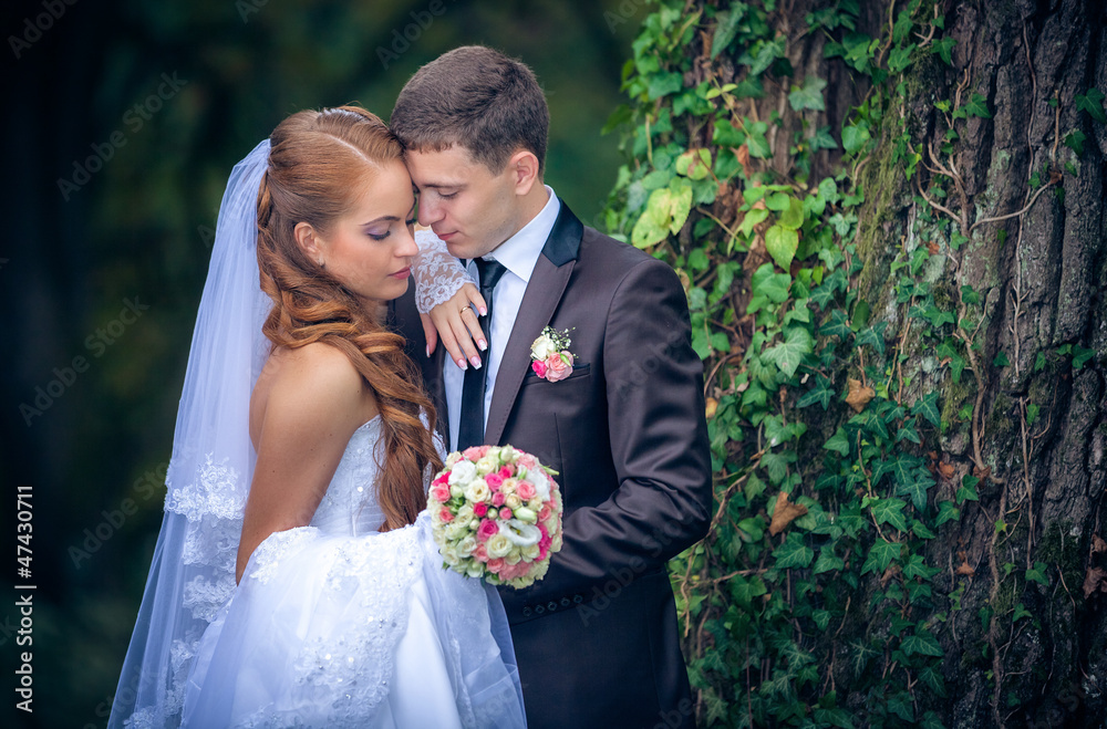 Happy Bride and groom on their wedding day Happy Bride and groom on their wedding day