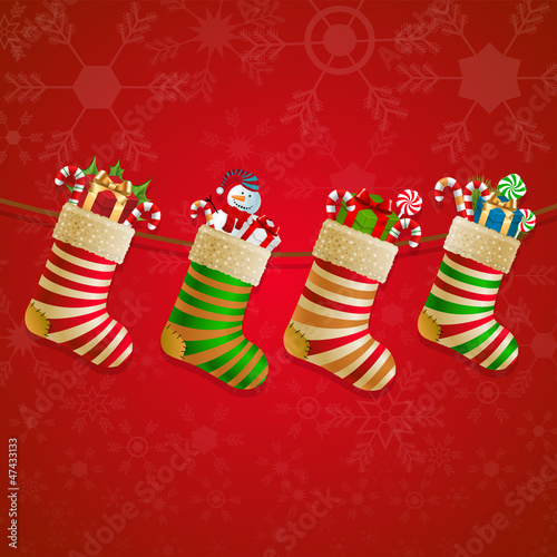 Hanging christmas socks with present.
