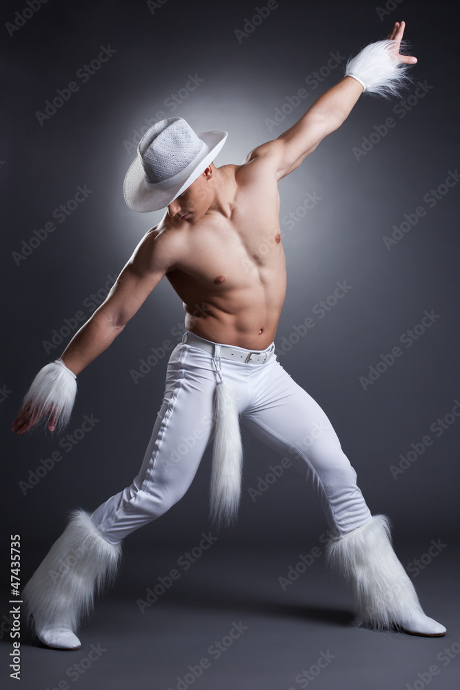 Sexy dancer in cowboy costume Stock Photo | Adobe Stock