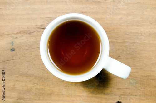 a cup of tea on wood background