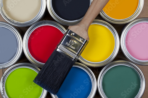 Tins of colorful paint