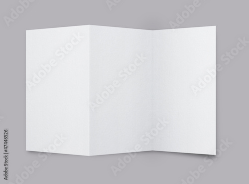 Blank paper brochure isolated on gray background with copy space