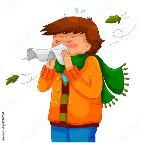 person blowing his nose in a chilly weather