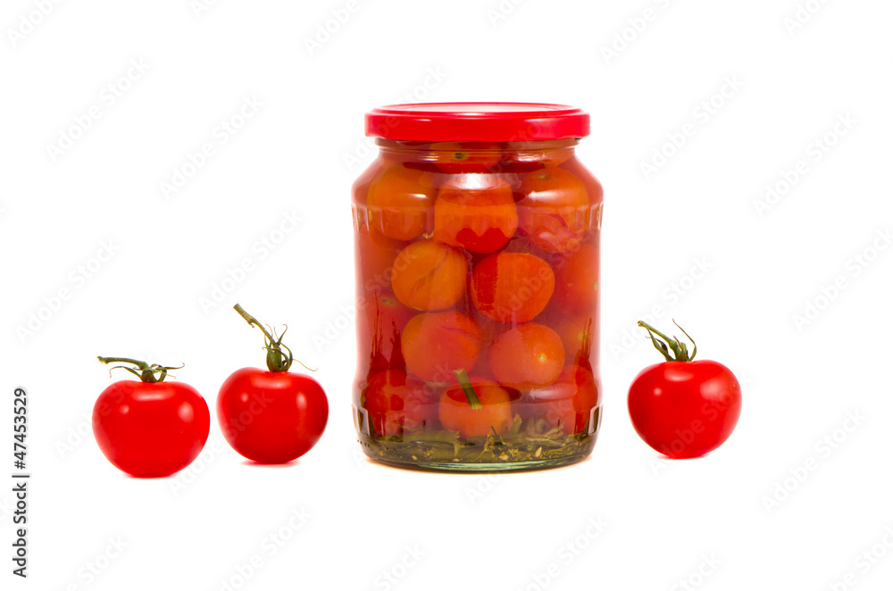 fresh and potted tomato glass jar isolated on white fresh and potted tomato glass jar isolated on white