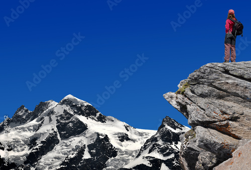 girl looking at the Mount Breithorn in the Swiss Alps