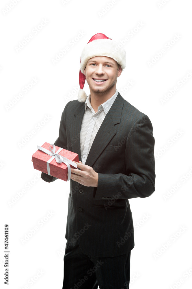 cheerful businessman in santa hat holding red gift cheerful businessman in santa hat holding red gift