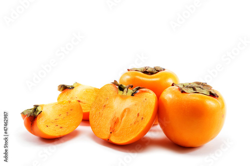 Persimmons isolated on white background.
