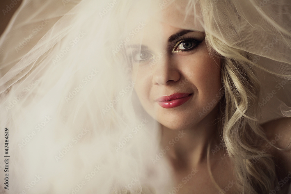 portrait of a beautiful blonde bride. daylight. studio shot