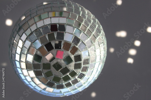 Christmas disco ball with sunlight spots