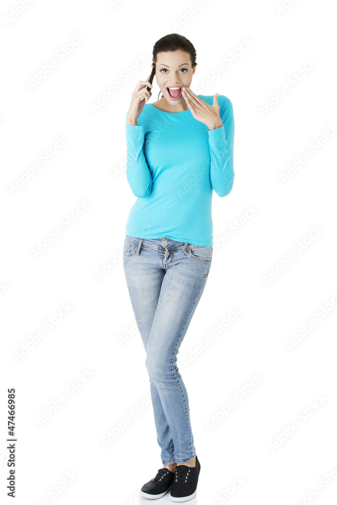 Happy surprised woman with cell phone Happy surprised woman with cell phone