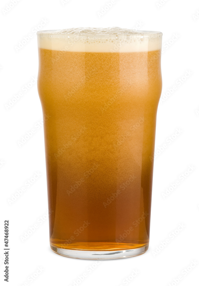 Fresh red beer with deep foam in a pint glass Fresh red beer with deep foam in a pint glass