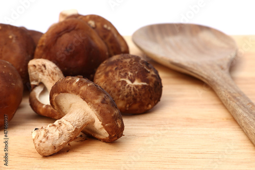 Fresh mushroom on a wooden board