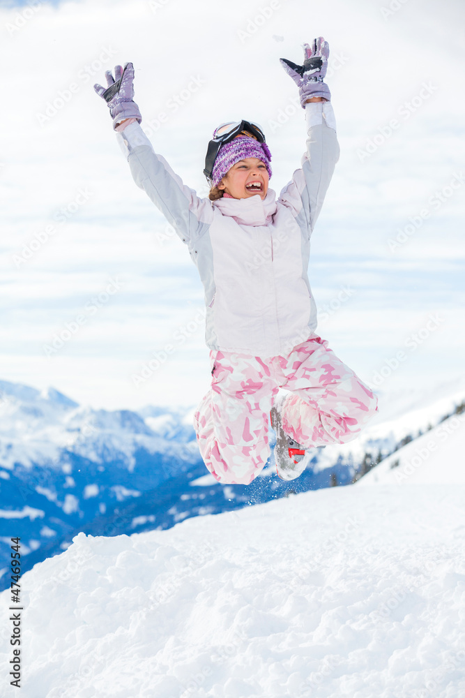 Young skier jumping