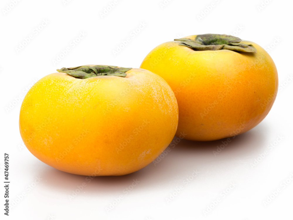 orange persimmons isolated on white background orange persimmons isolated on white background