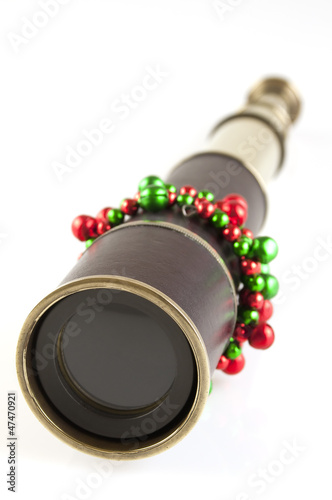 telescope brass close up with decorations