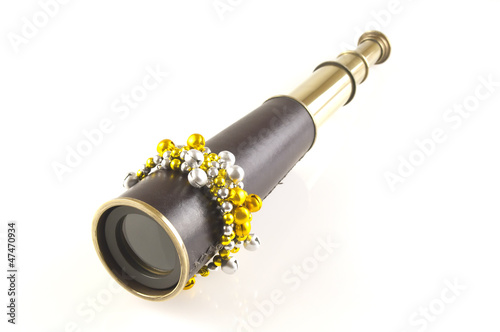 telescope with gold and silver christmas decorations