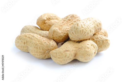 Composition from peanuts on the white background