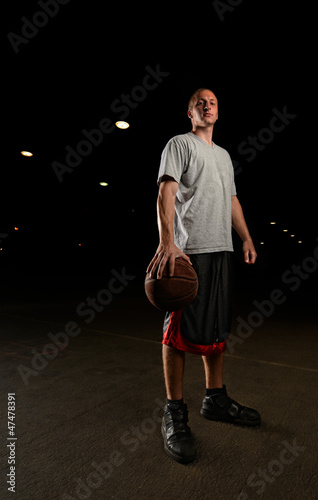 Basketball player with ball © vlorzor