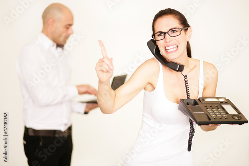 Frau und Mann im Büro photo