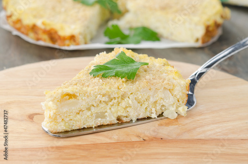 piece of tart with cabbage and cheese closeup