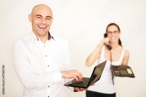 Geschäftsführer mit Netbook photo
