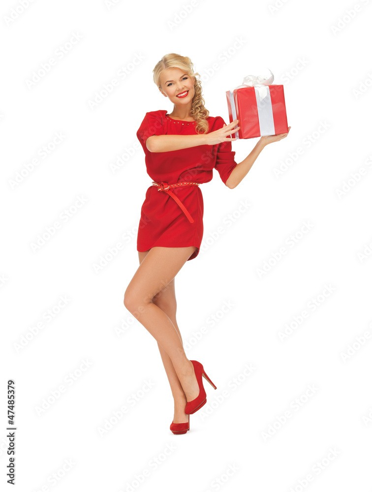 lovely woman in red dress with present lovely woman in red dress with present