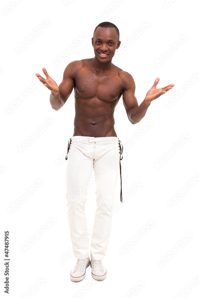Full length of friendly smiling muscular man Full length of friendly smiling muscular man