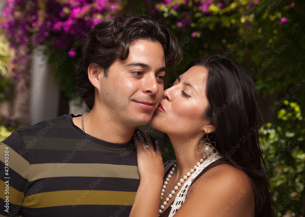 Happy Attractive Hispanic Couple At The Park Happy Attractive Hispanic Couple At The Park