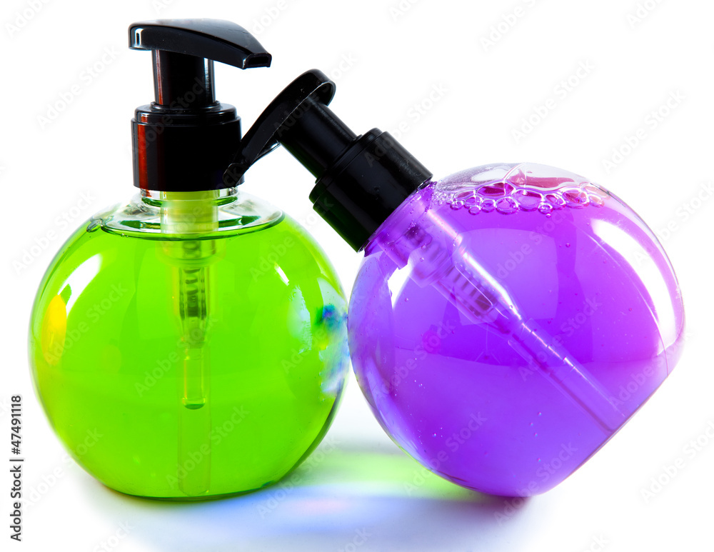 Fototapeta premium Two bright color cosmetic small bottles with the dispenser