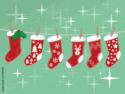 Christmas socks hanging on rope vector