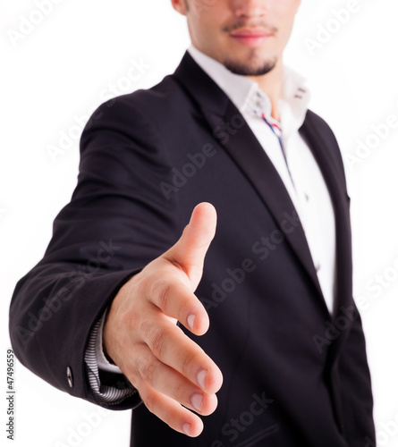 A business man with an open hand ready to seal a deal, isolated