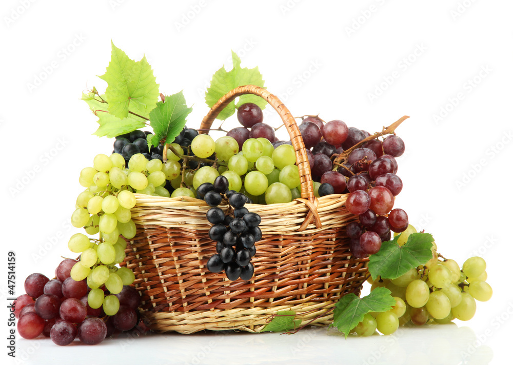 assortment of ripe sweet grapes in basket, isolated on white. assortment of ripe sweet grapes in basket, isolated on white.