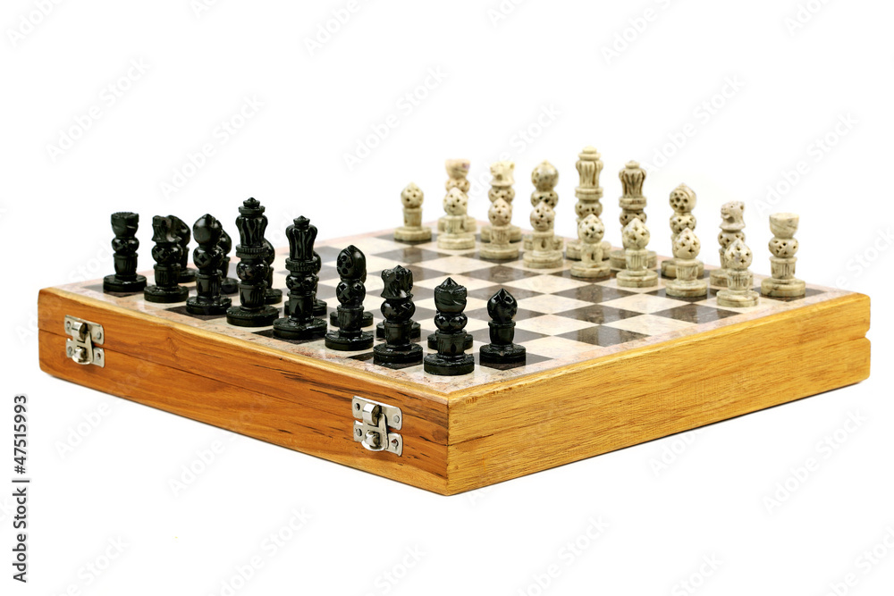 Old Decorative Chessboard with Figurines in Perspective Old Decorative Chessboard with Figurines in Perspective