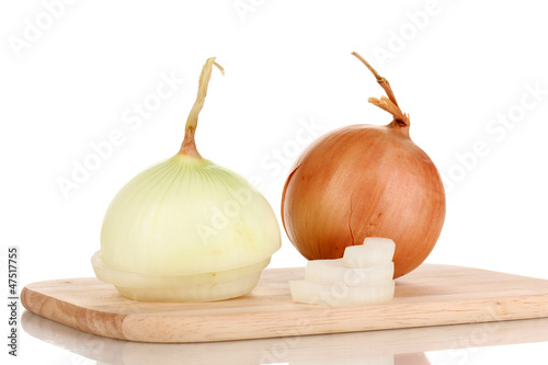 Ripe cut onions on board isolated on white