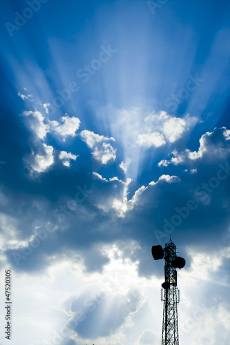 Telecommunication tower/mast on blue sky. -background