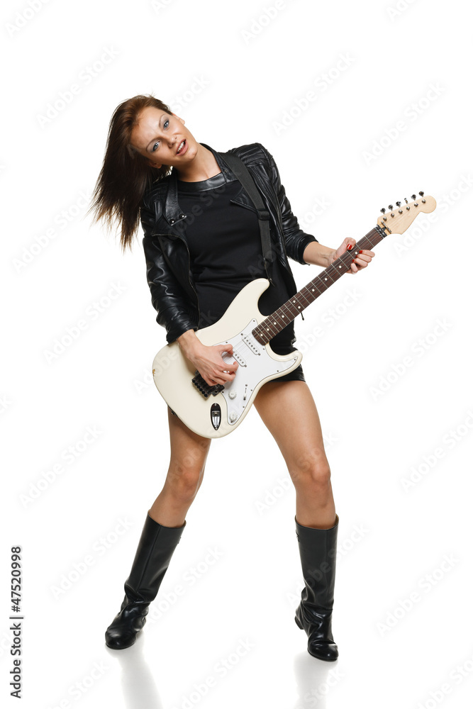 Expressive woman playing the guitar in full length Expressive woman playing the guitar in full length