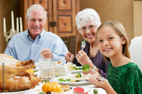 Granddaughter Celebrating Thanksgiving With Grandparents