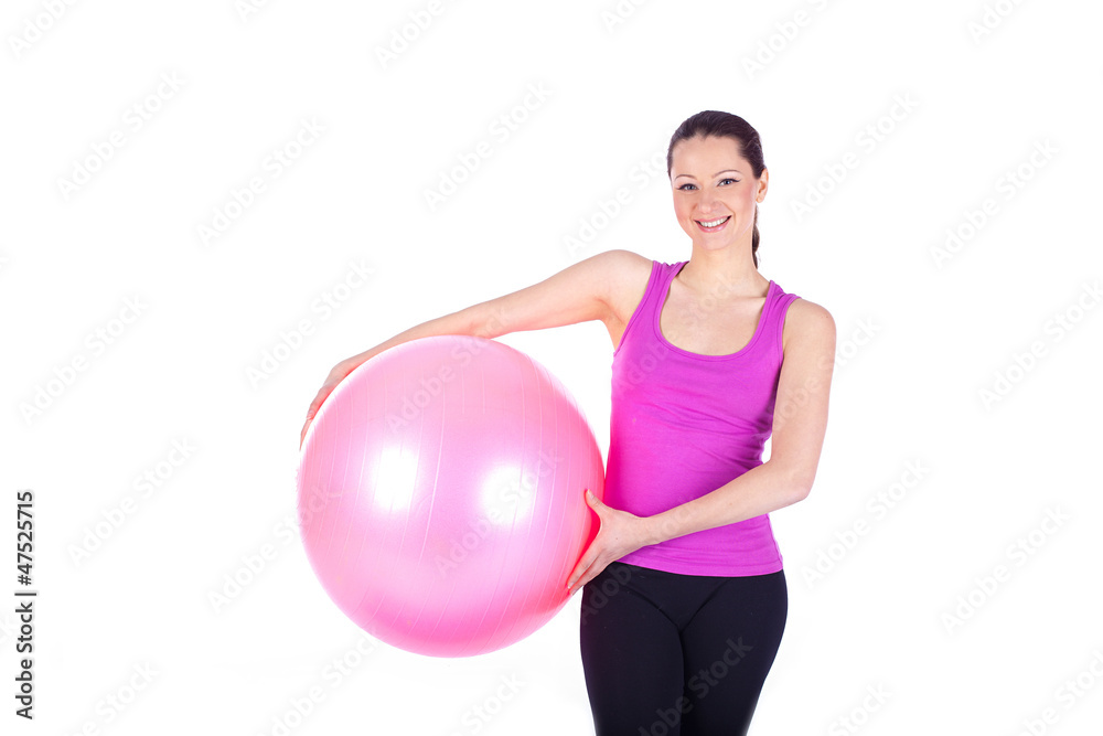 healthy young woman exercising with fit-ball in gym healthy young woman exercising with fit-ball in gym