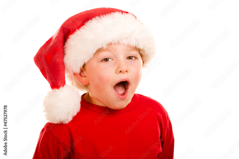 Portrait of happy child wearing Santa hat Portrait of happy child wearing Santa hat