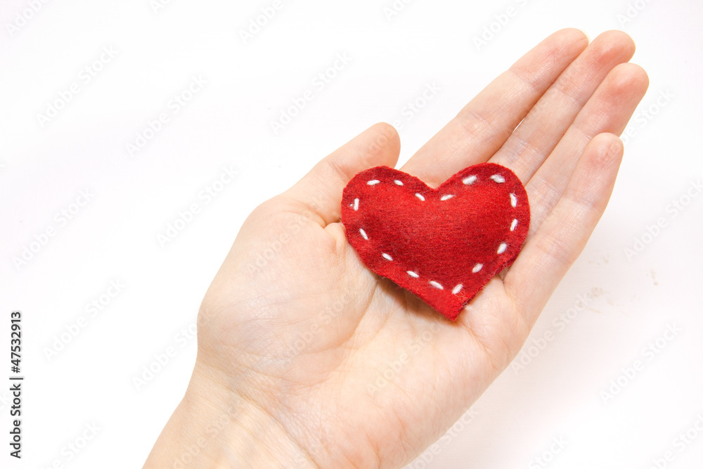 Red heart in hand Red heart in hand