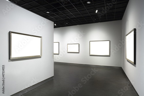 empty frames in museum photo