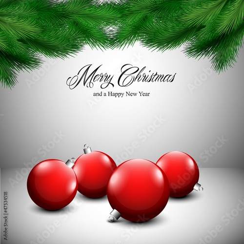 Christmas card with ornaments on a gray and white background