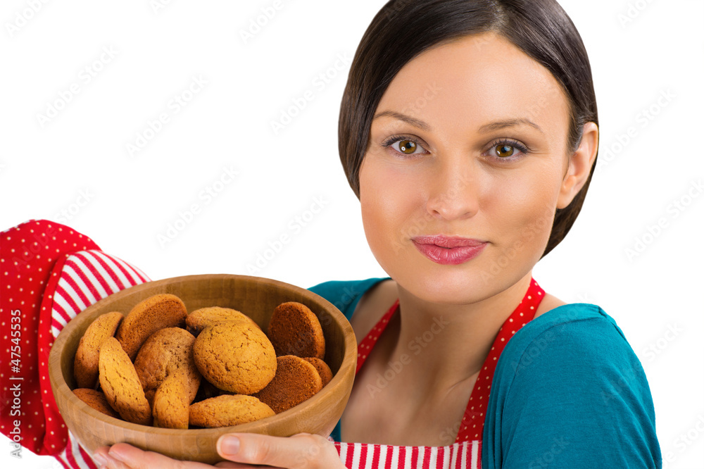 Young pretty woman holdin tasty fresh oatmeal cookies. Young pretty woman holdin tasty fresh oatmeal cookies.