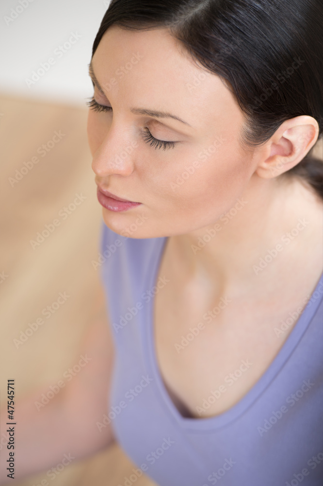 Portrait of beautiful young woman doing yoga exercise - Meditati Portrait of beautiful young woman doing yoga exercise - Meditati