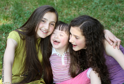 Happy little girl with sisters © denys_kuvaiev