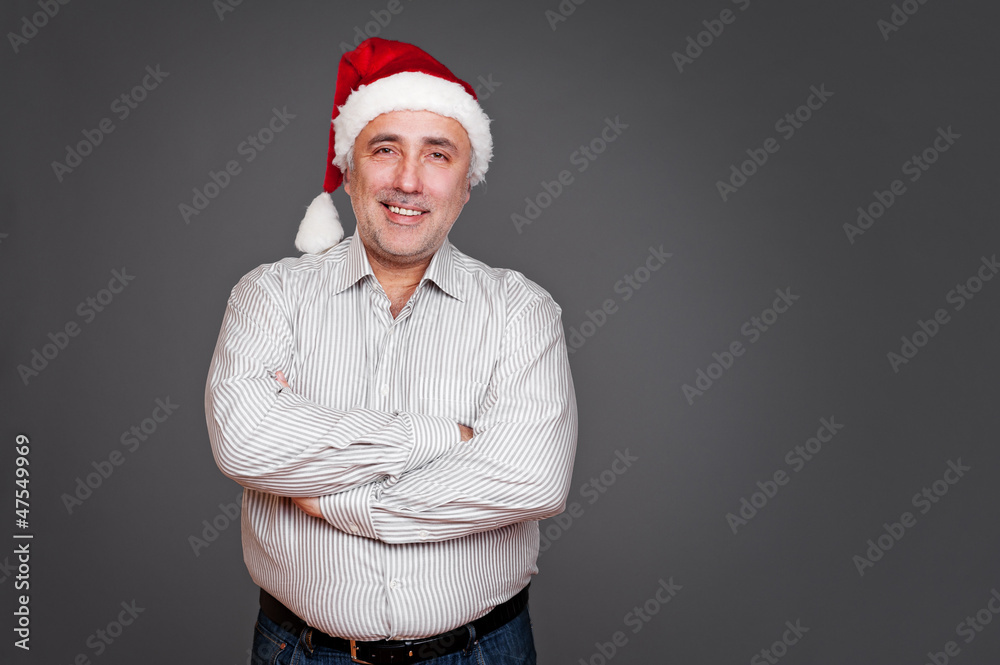 excited senior man in santa claus hat excited senior man in santa claus hat
